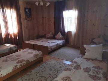 Фото номера Семейный номер с балконом Гостевой дом Мандариновый рай г. Новый Афон 7