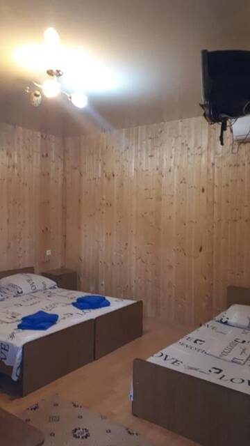 Фото номера Бунгало с видом на сад Гостевой дом Мандариновый рай г. Новый Афон 15