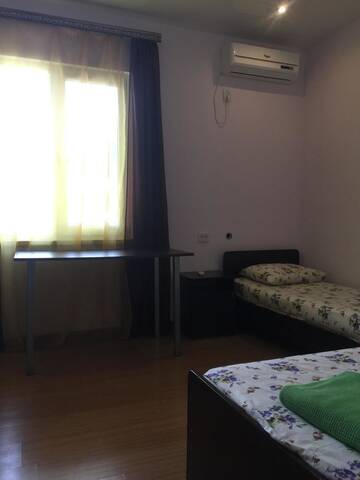 Фото номера Стандартный трехместный номер Гостевой дом Guest house on Gagarina 10 г. Новый Афон 5