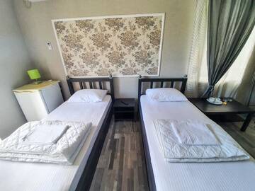 Фото номера Небольшой двухместный номер с 2 отдельными кроватями Отель Park Hotel U Monastirya г. Новый Афон 3