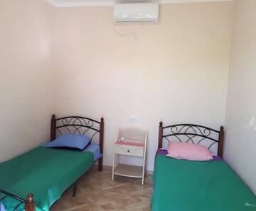 Фото номера Двухместный номер с 2 отдельными кроватями Мини-отель Inzhir Guest house г. Новый Афон 8