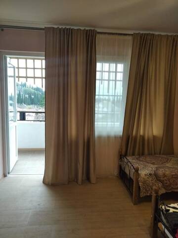 Фото номера Стандартный четырехместный номер Мини-отель Inzhir Guest house г. Новый Афон 4
