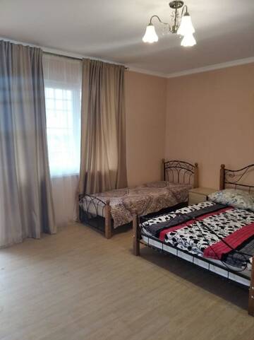 Фото номера Стандартный четырехместный номер Мини-отель Inzhir Guest house г. Новый Афон 5