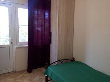 Фото номера Двухместный номер с 2 отдельными кроватями Мини-отель Inzhir Guest house г. Новый Афон 4