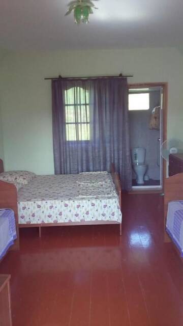 Фото номера Четырехместный номер с видом на горы Гостевой дом Guesthouse on Topchan 17 г. Новый Афон 5