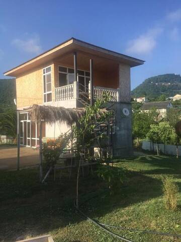 Фото номера Четырехместный номер с видом на море Гостевой дом Guesthouse on Topchan 17 г. Новый Афон 9