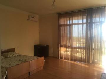 Фото номера Четырехместный номер с видом на море Гостевой дом Guesthouse on Topchan 17 г. Новый Афон 6