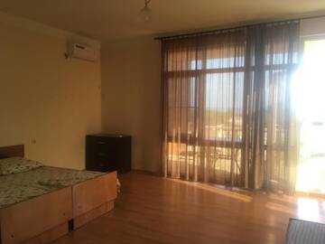 Фото номера Четырехместный номер с видом на море Гостевой дом Guesthouse on Topchan 17 г. Новый Афон 11