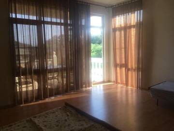 Фото номера Четырехместный номер с видом на море Гостевой дом Guesthouse on Topchan 17 г. Новый Афон 8
