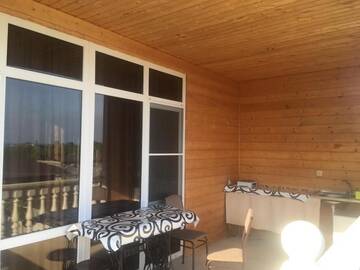 Фото номера Четырехместный номер с видом на море Гостевой дом Guesthouse on Topchan 17 г. Новый Афон 3