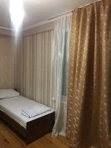 Фото номера Бюджетный двухместный номер с 2 отдельными кроватями Гостевой дом Нанули г. Новый Афон 6