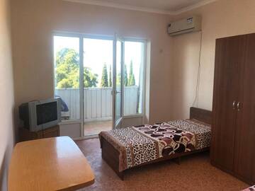 Фото номера Апартаменты с 1 спальней Апартаменты Apartment on Lakoba 34 г. Новый Афон 52